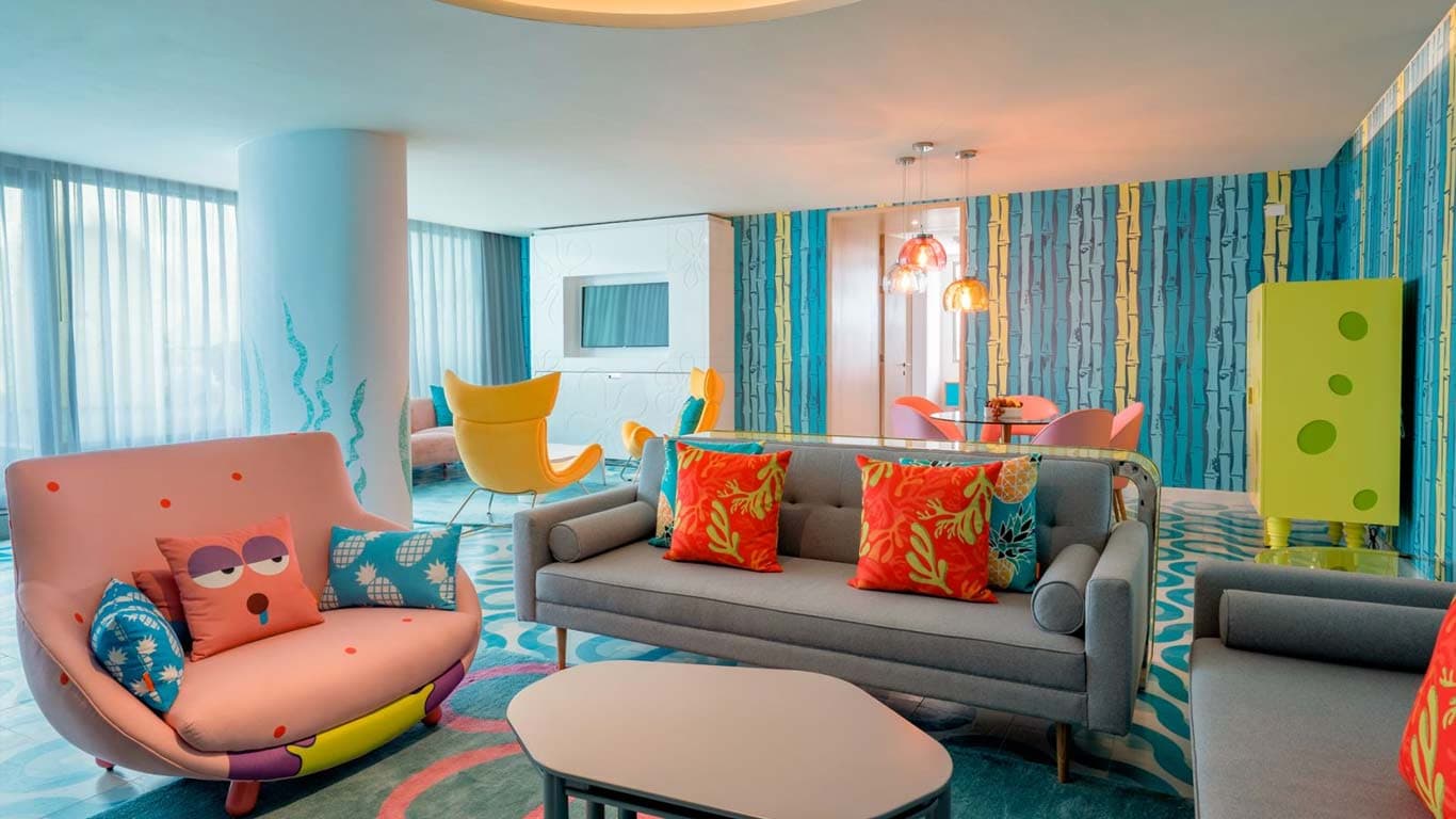 Colorful themed suite living area at Nickelodeon Hotels & Resorts Riviera Maya