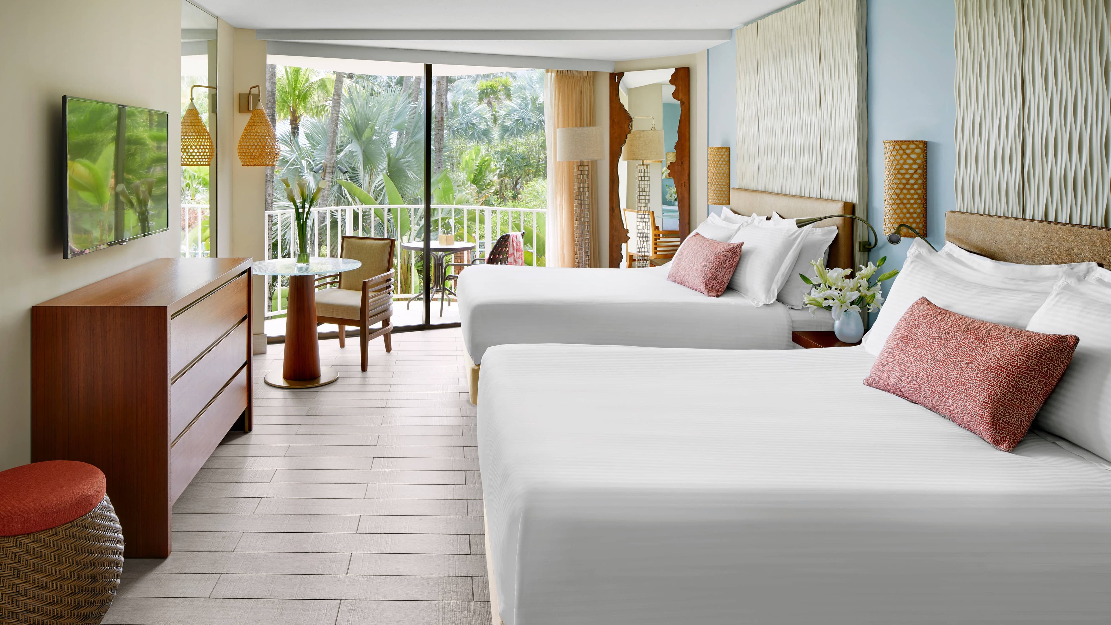 Renovated guest room with ocean hues at The Coral at Atlantis, Bahamas