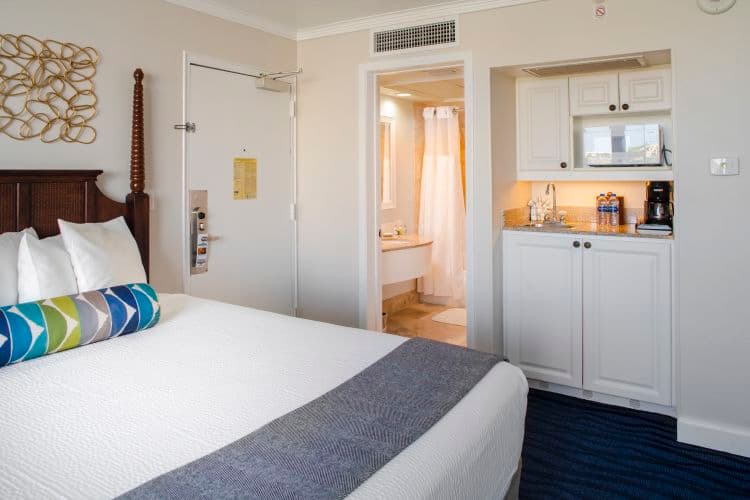 Tropical View room with balcony and two queen beds at Island Grand at TradeWinds